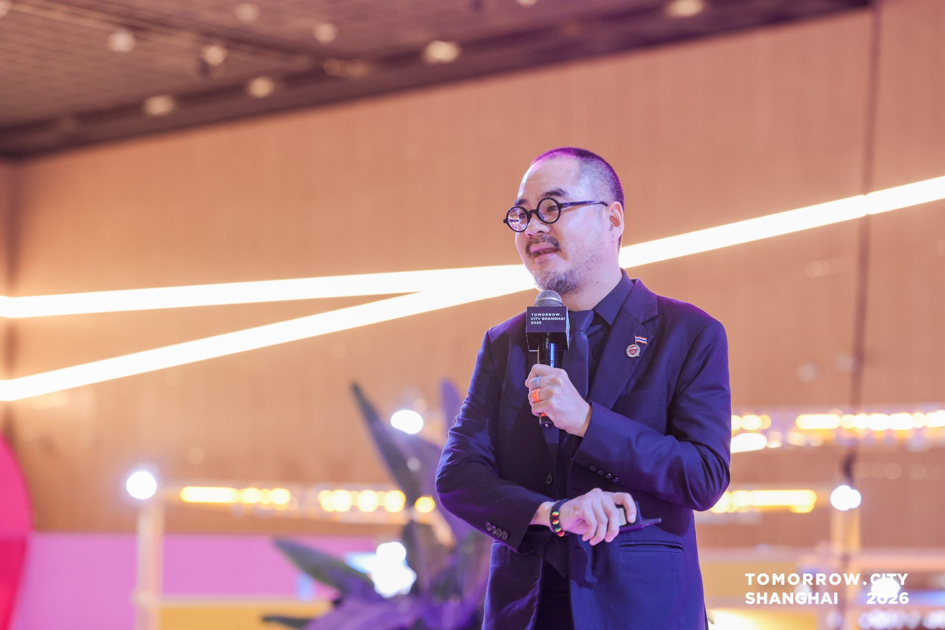 Dr. Non on the Tomorrow.City Shanghai main stage with the mic flag in frame